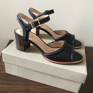 Clark’s “Ellis Clara” black leather sandals